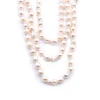 Baroque Seed Pearl Triple Strand Necklace with 14 Karat Yellow Gold Clasp