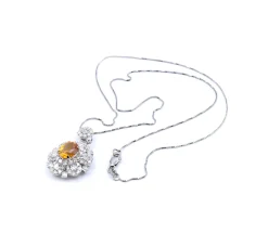 14 Karat White Gold Orange Sapphire and Diamond Necklace