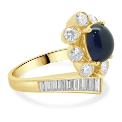 18 Karat Yellow Gold Cabochon Cut Sapphire and Diamond Bypass Ring