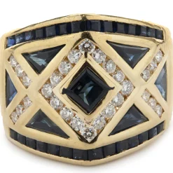 18 Karat Yellow Gold Channel Set Sapphire and Diamond Ring