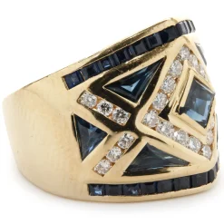 18 Karat Yellow Gold Channel Set Sapphire and Diamond Ring