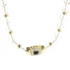Mings 14 Karat Yellow Gold Diamond and Onyx Necklace