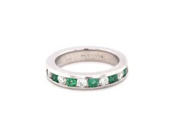 Platinum Channel Set Diamond and Emerald Band