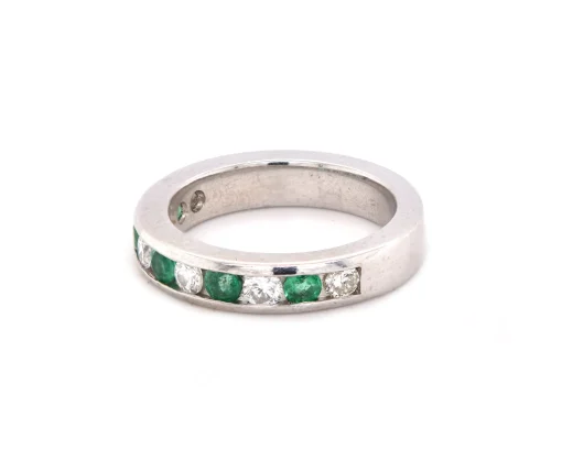 Platinum Channel Set Diamond and Emerald Band