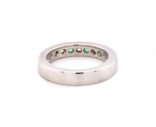 Platinum Channel Set Diamond and Emerald Band